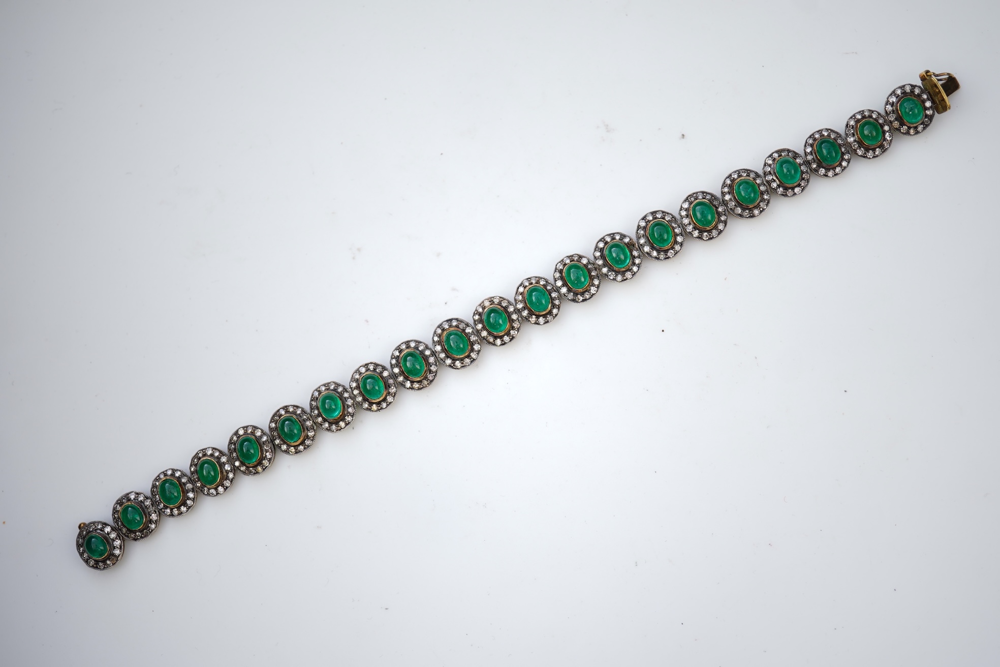An emerald and diamond bracelet